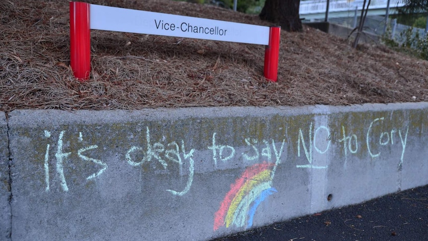 A sign saying its OK to say NO to Cory chalked outside a say NO to same sex rally in Hobart