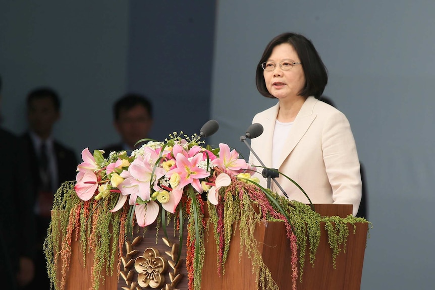 Taiwanese President Tsai Ing-wen behind a lectern