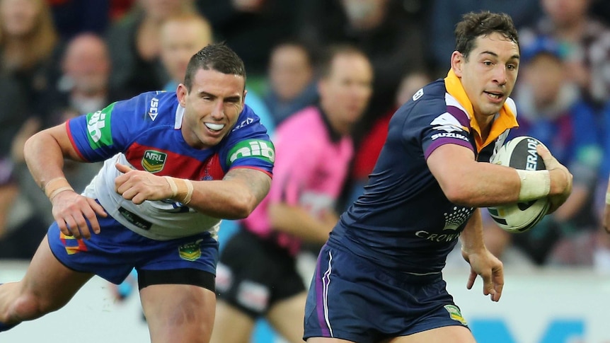 Match winner ... Billy Slater beats the tackle of Darius Boyd