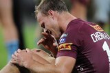 Daly Cherry-Evans holds injured knee in Origin one