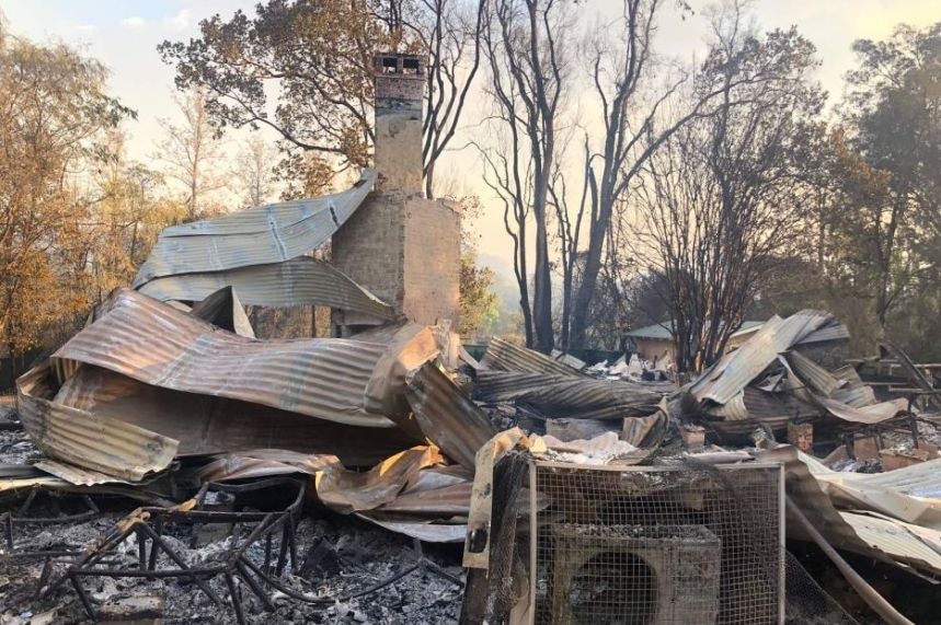 A collapsed school building following a bushfire