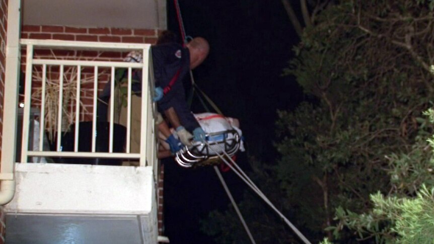 180kg man is winched from first floor balcony after collapse
