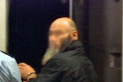 A TV still of Wassim Fayad after he appeared in Court over the whipping of a man in his bed. (ABC TV)