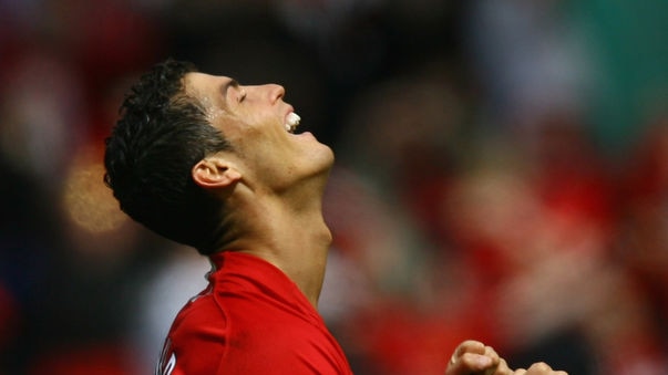 Cristiano Ronaldo celebrates as United wins the title