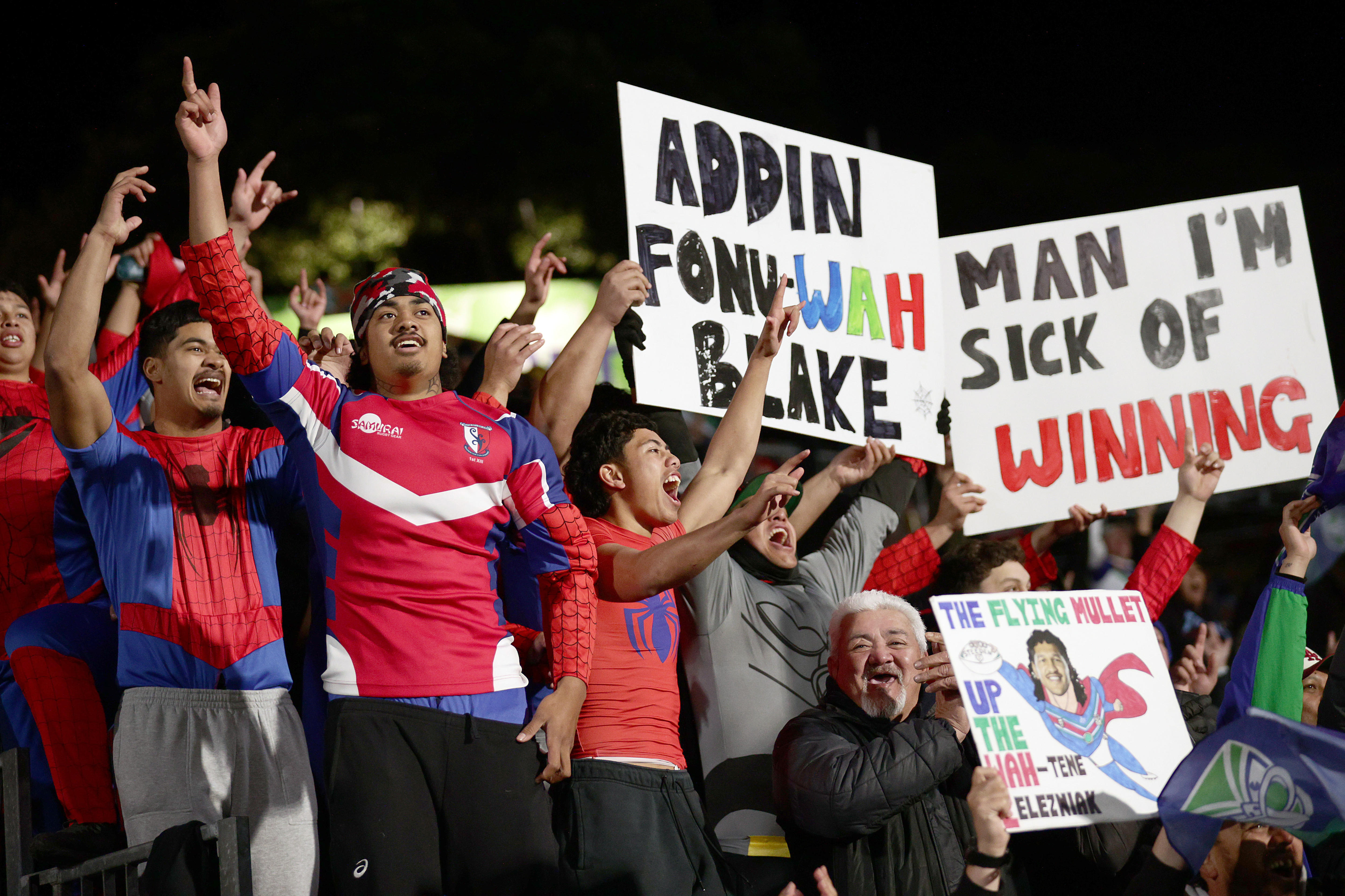 A group of rugby league fans support their team