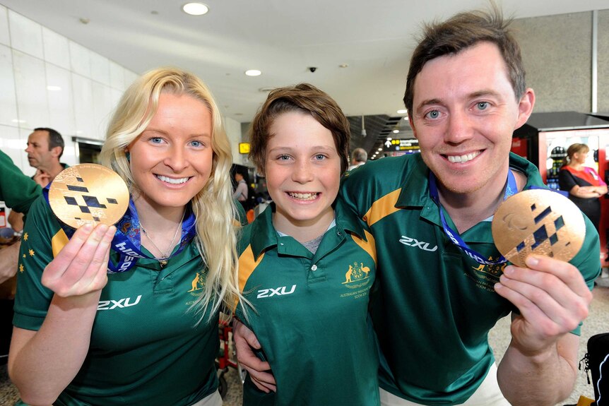 Australian Winter Paralympic medallists arrive at Melbourne Airport.