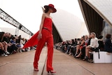 Model walks down the runway at the Sydney Opera House