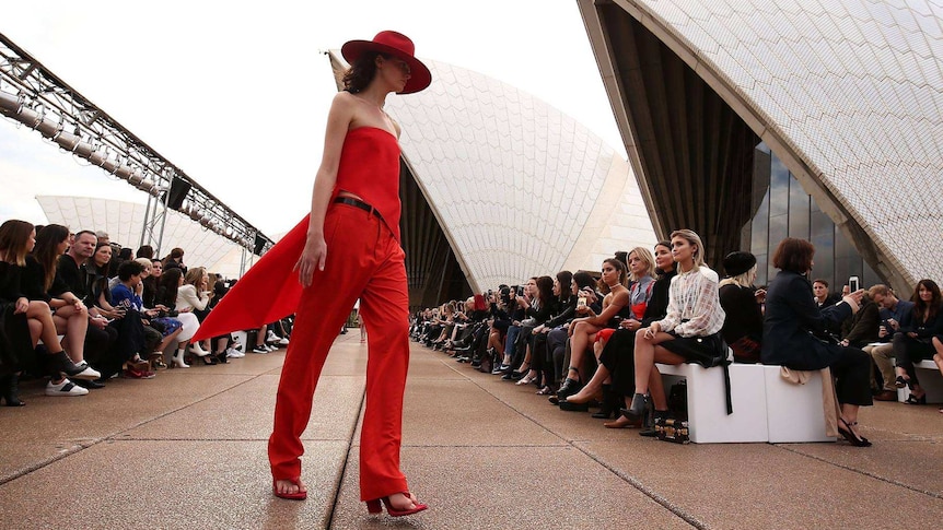 Model walks down the runway at the Sydney Opera House