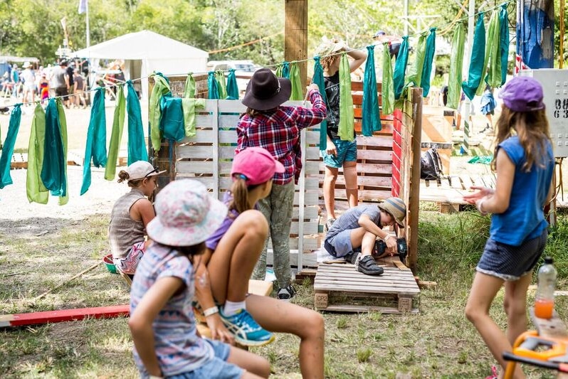 Children build a cubby house