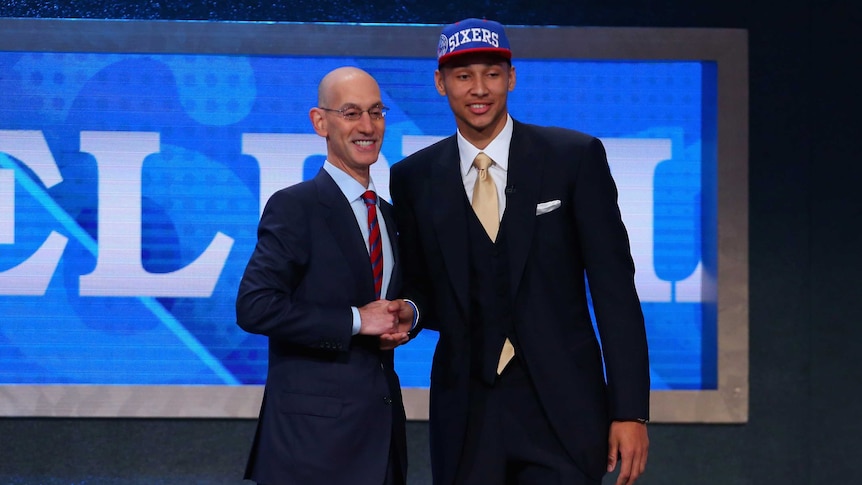 Ben Simmons poses with NBA chief Adam Silver after being taken by Philadelphia 76ers at NBA Draft.