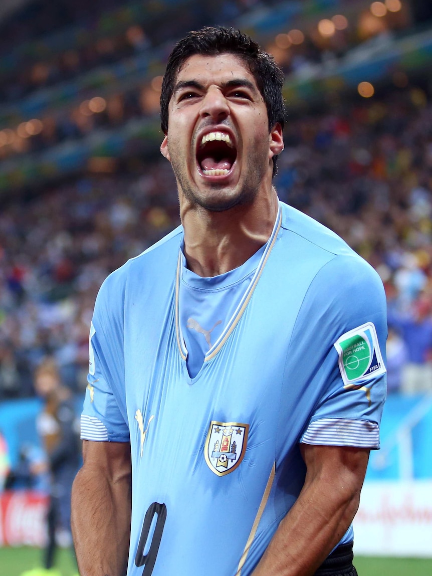 Suarez celebrates against England