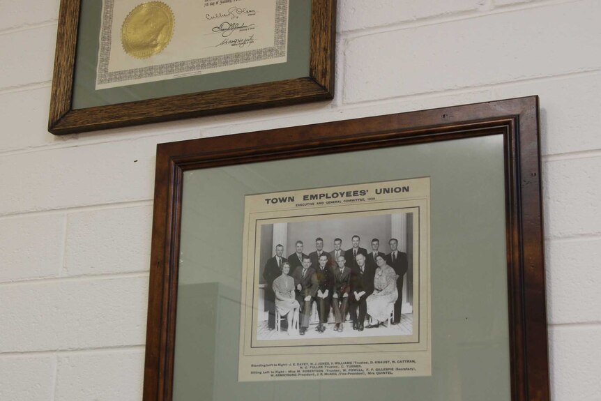 A photo of the TEU committee in 1939 hangs in Rosslyn Ferry's office.