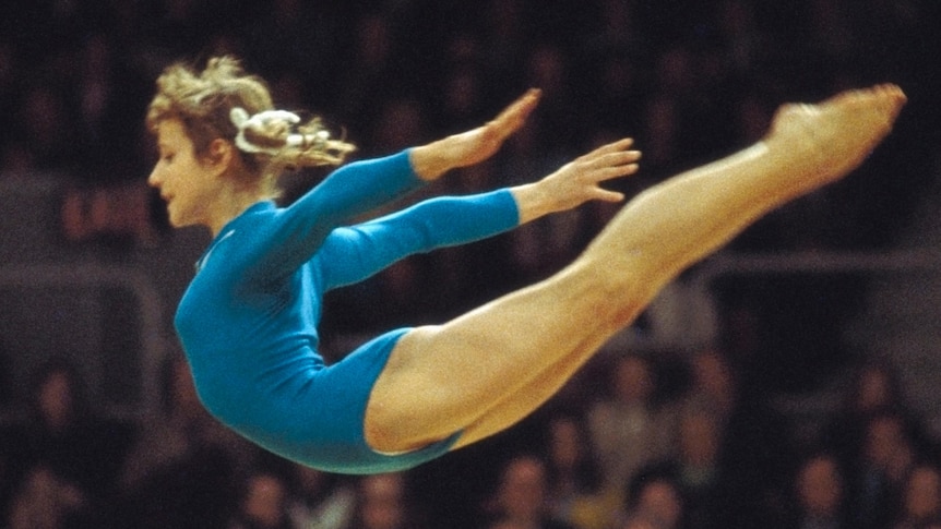 To understand the 'systemic risk factors for abuse' in women's gymnastics, look to its roots