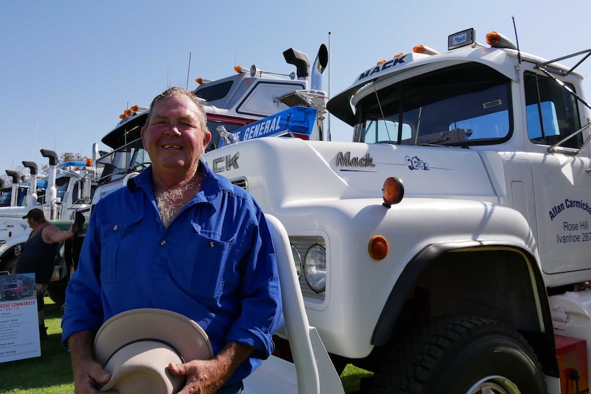 Truck owner Allan Carmichael standing in front of his Mack truck at the Ivanhoe truck and tractor show
