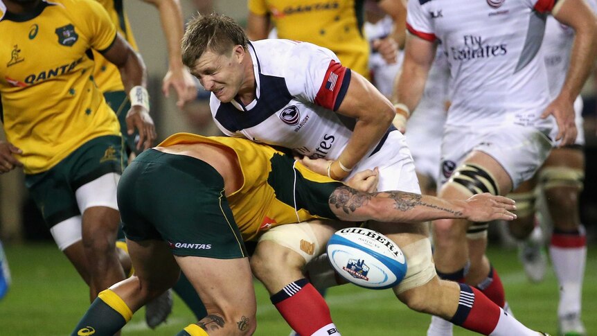 USA's Luis Stanfill loses the ball against Wallabies