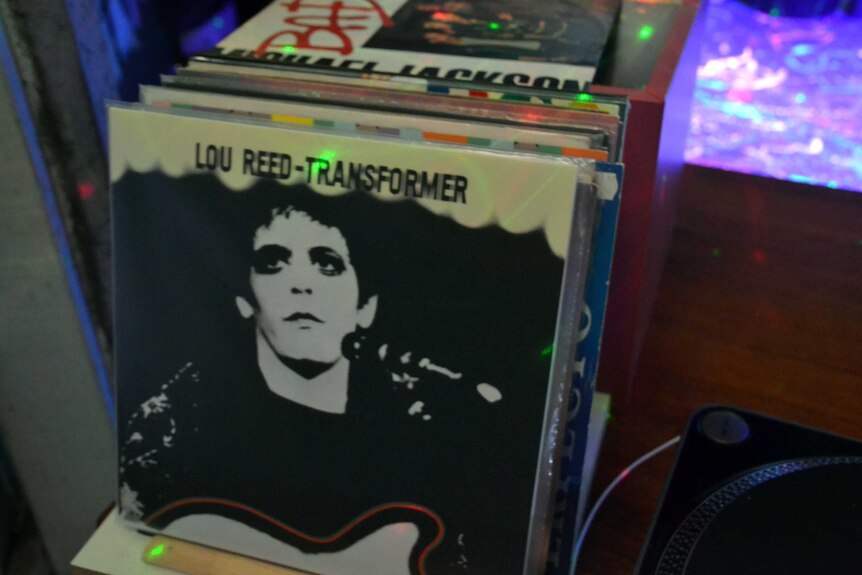A Lou Reed album is seen at Julian Scharf's party.
