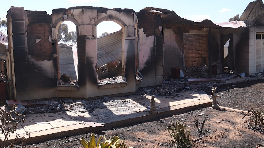 A house destroyed by bushfire at Hamley Bridge,