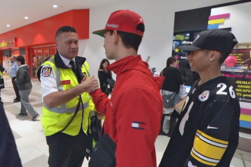 Maori warden James Smith meets with youth while on patrol in Werribee.