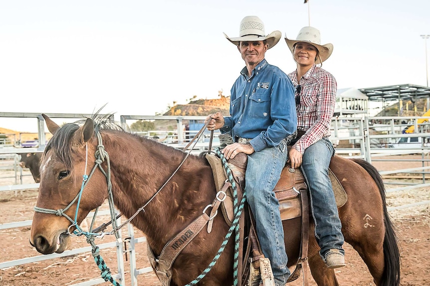 Darren and Dakota Brandenburg sitting on a horse