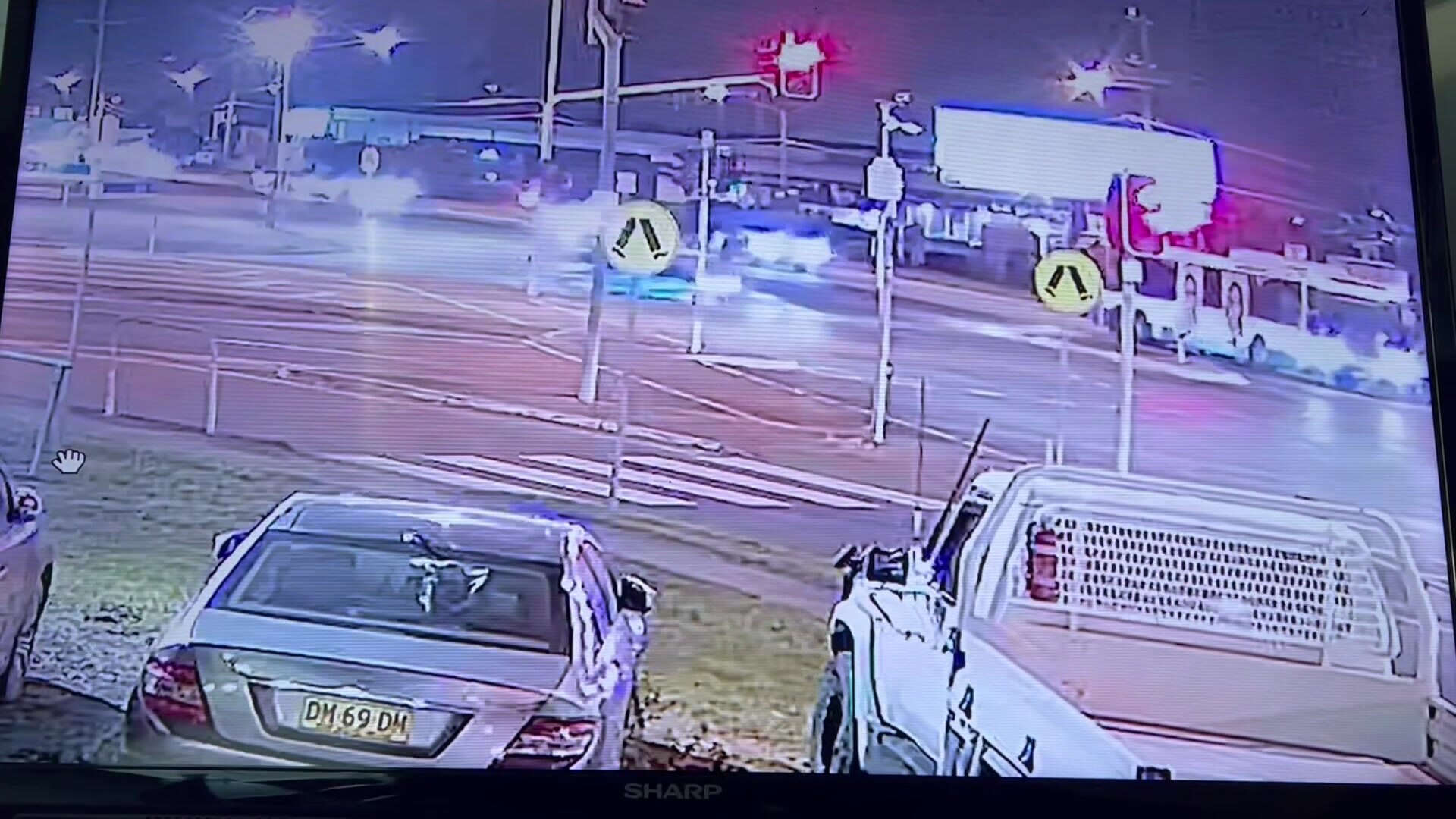 CCTV footage shows the car crashing into the side of the bus - ABC News