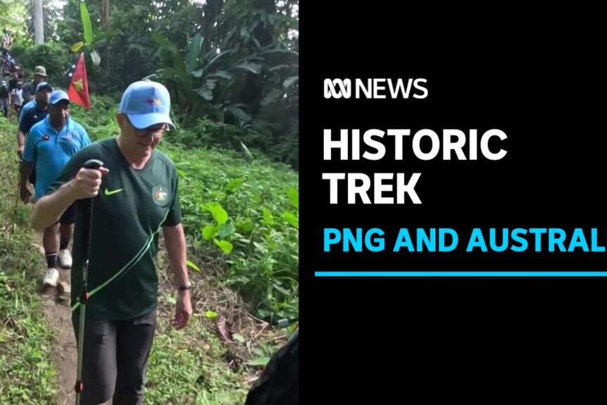 Historic Trek, PNG And Australia: Anthony Albanese holding a hiking pole on a jungle trail.