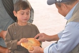 WFP is distributing bread to people displaced from Kunduz to Mazar-e-Sharif