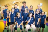 Diana Sully standing with members of the Riverland Special School Girl Guides unit.