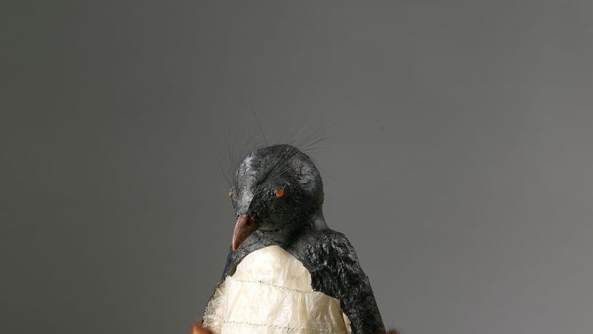 A sculpture of a penguin made from animal remains
