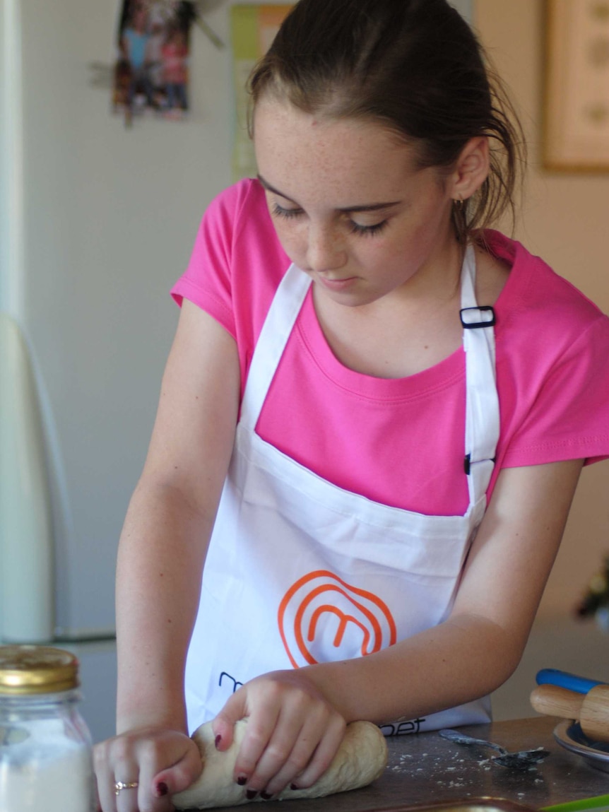 Teenager cooking in the kitchen