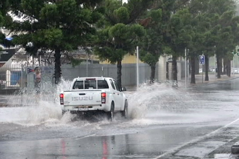 Truck driving through flash flooding at Geelong