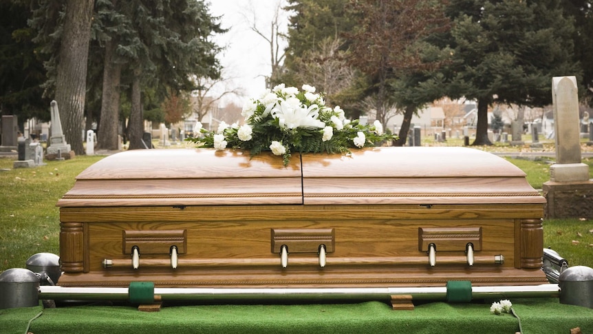 A coffin at a funeral