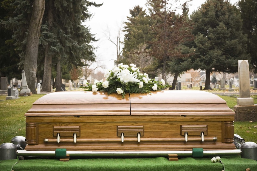 A coffin at a funeral