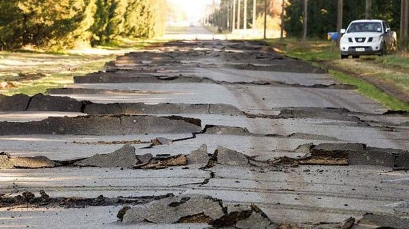 NZ quake: A road in Christchurch is destroyed