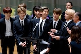 Members of the Korean K-Pop group BTS attend a meeting at the U.N.