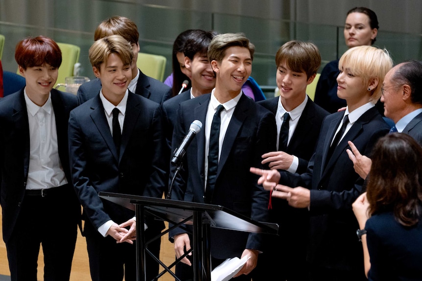 Members of the Korean K-Pop group BTS attend a meeting at the U.N.