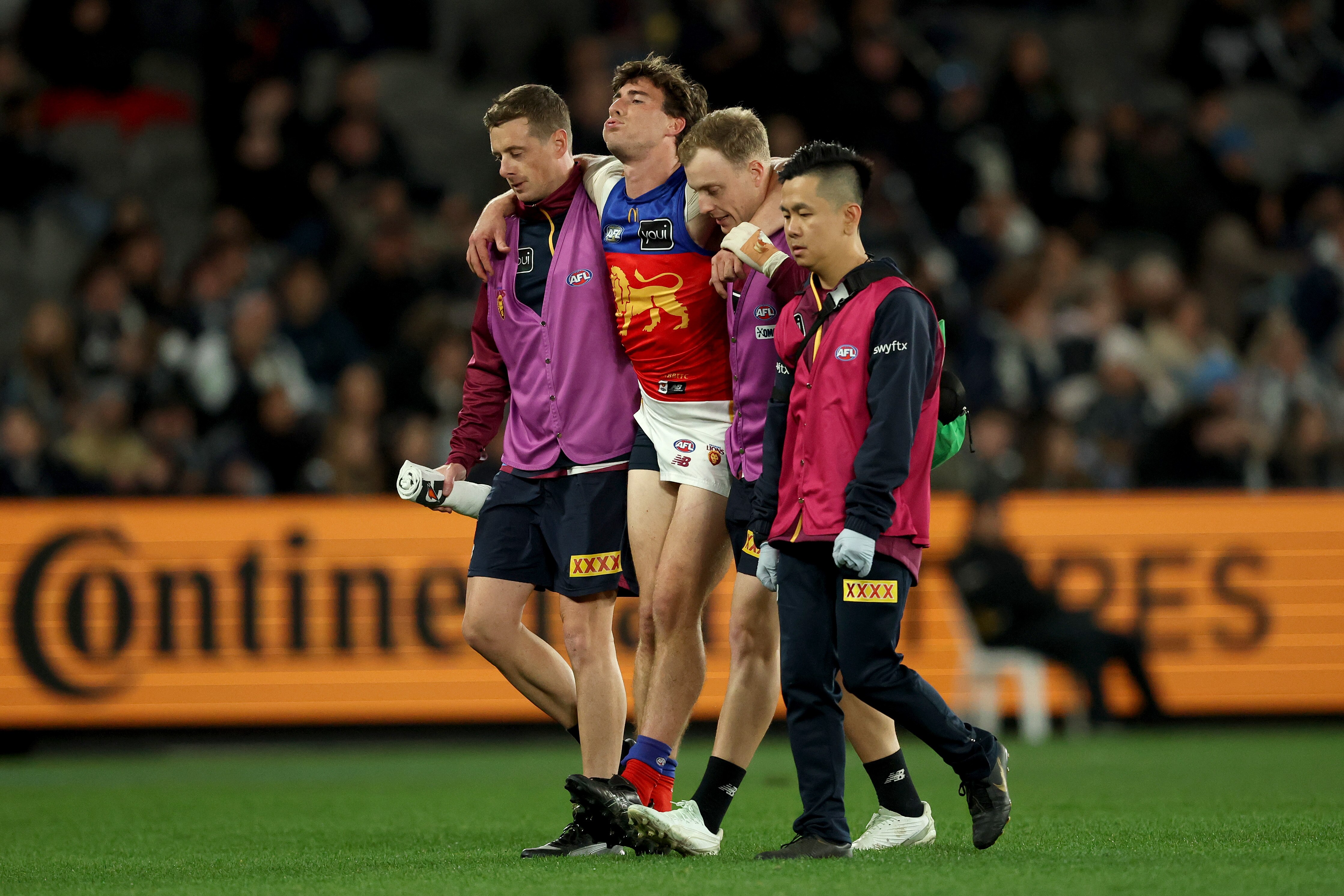 Injuries and ump contact as Lions prevail in Melbourne
