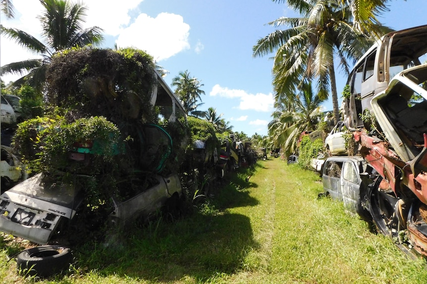 Abandoned cars on the main island of Tongatapu in the Kingdom of Tonga