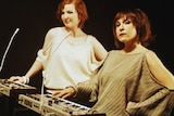 Two women with 20th century synthesisers