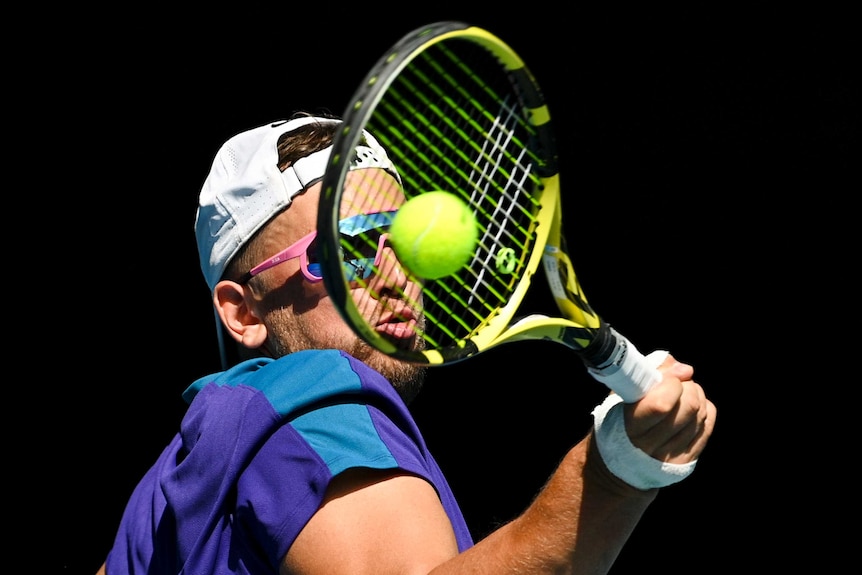 Dylan Alcott plays a forehand against Niels Vink at the Australian Open in Melbourne.