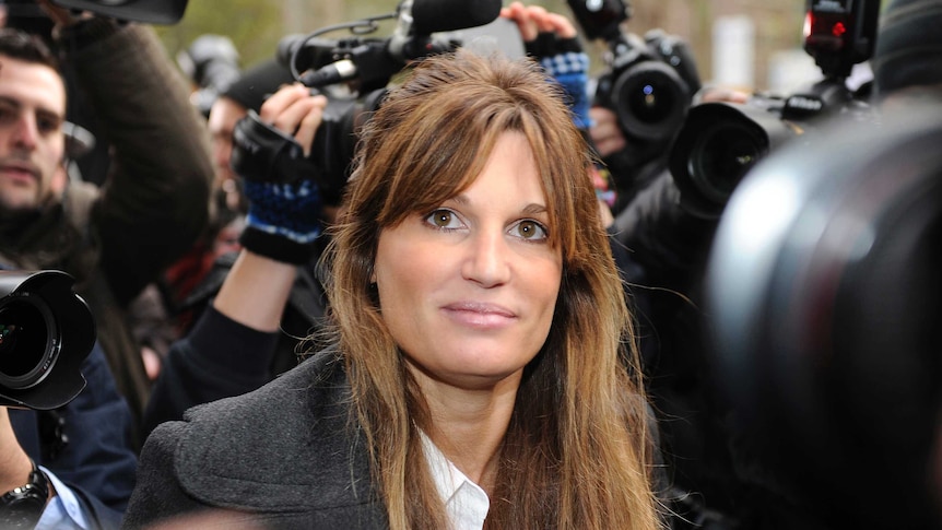 Jemima Khan surrounded by reporters