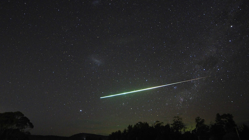 Meteor shoots across the sky