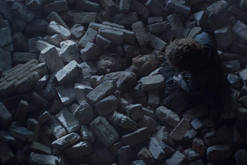Tyrion discovers the bodies of Cersei and Jaime under rubble.