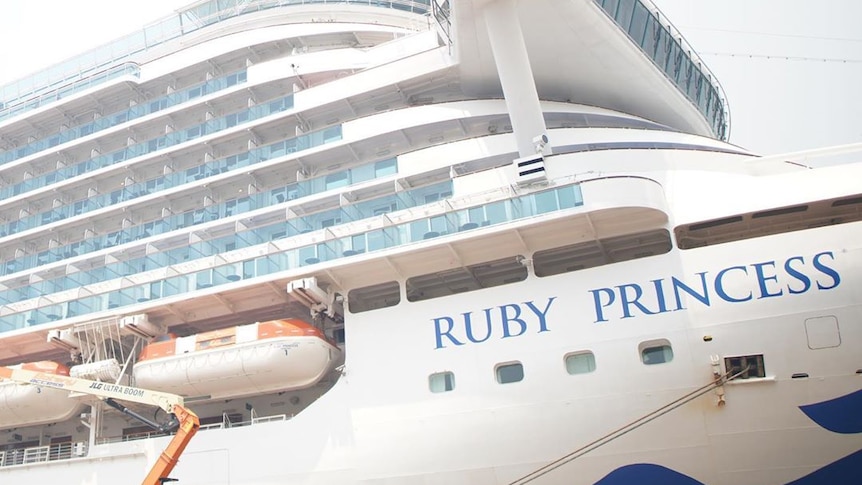 a cruise ship with the name ruby princess on the side