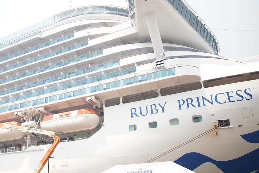 a cruise ship with the name ruby princess on the side