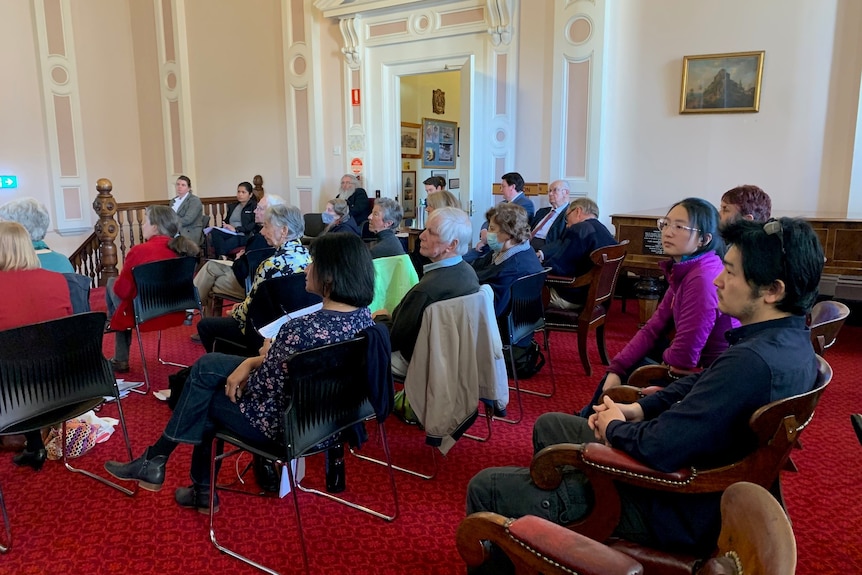 Public gallery at the Launceston Council meeting filled with people for and against the development