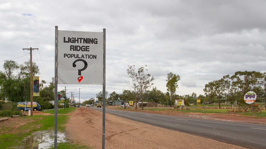Lightning Ridge's population sign has a question mark on it.