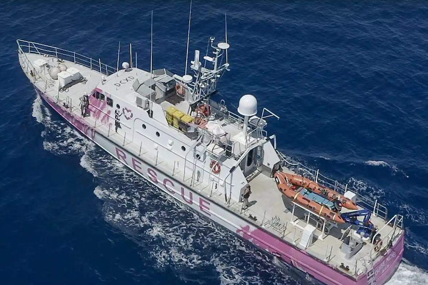 White rescue vessel with pink art