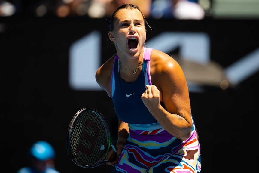 A Belarusian female tennis player screams out as she pups herself up during a match at the Australian Open.
