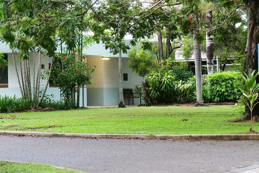 An external shot of a building surrounded by trees  in Townsville in North Queensland.