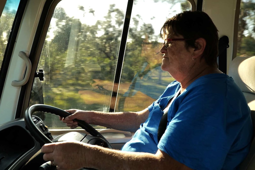 Wendy Welles driving a school bus.